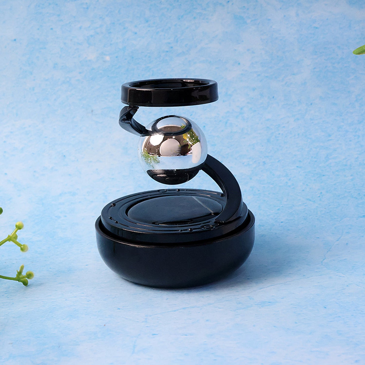 Rotating air freshener dashboard car ornament with glass sphere and metal spiral/ring structure-decorative display accessory