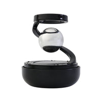 Rotating air freshener dashboard car ornament with glass sphere and metal spiral/ring structure-decorative display accessory